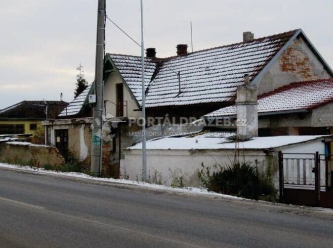 podíl 17/480 rodinného domu s pozemky v obci Postřižín, okres Mělník