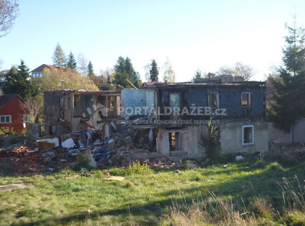 Ideální spoluvlastnický podíl 1/22 zbořeniště s pozemky v obci Jiříkov