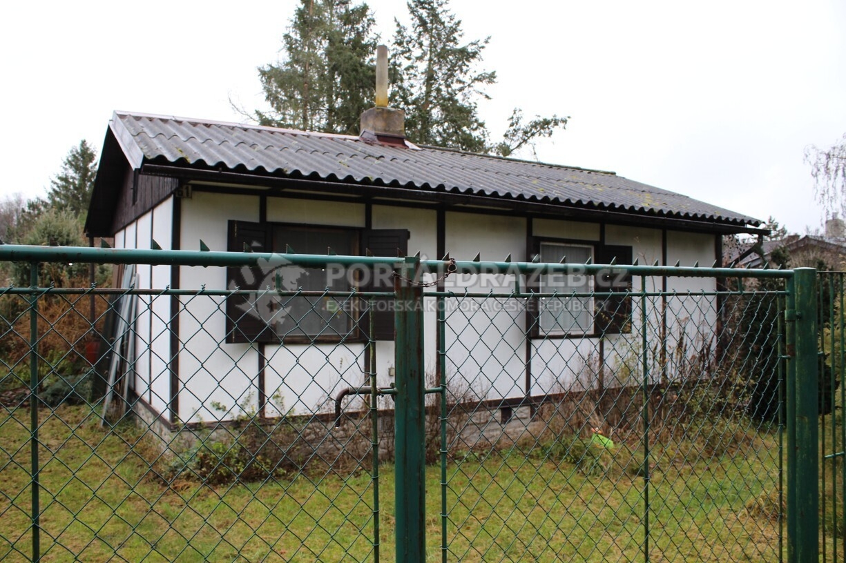 Spoluvlastnický podíl ½ k chatě včetně pozemku a