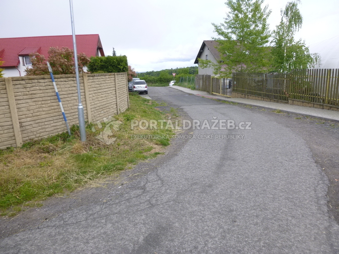 Pozemky a podíl na pozemcích v k.ú. Hradešín, okr. Kolín
