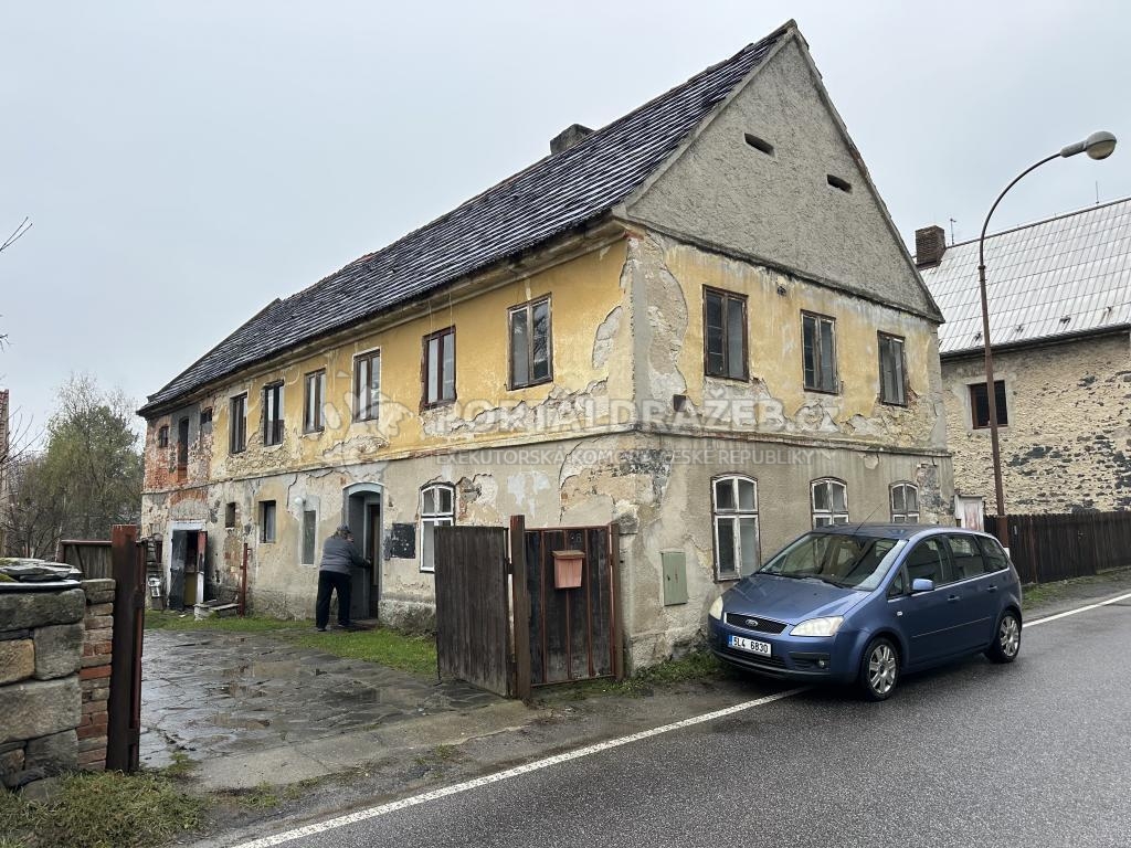 spoluvlastnický podíl 1/2 k domu v obci Kravaře
