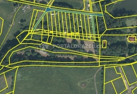 pozemky a podíl 1/17 na pozemcích v k.ú. Luby I,