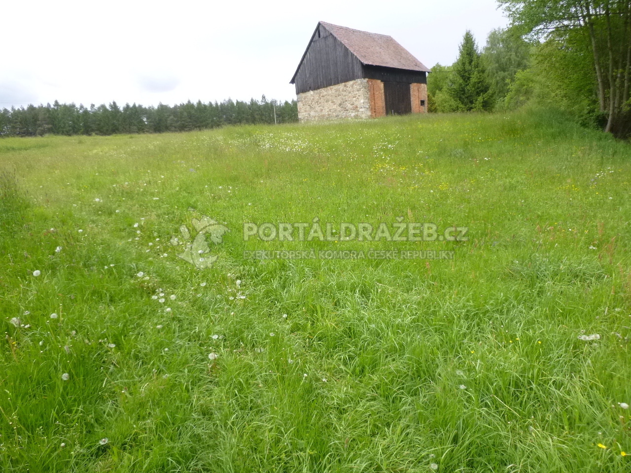 Podíl 2/9 na pozemku se zastavěnou plochou v k.ú.
