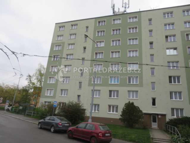 Byt 1+1 (č.j. 873/16) včetně podílu na spol.