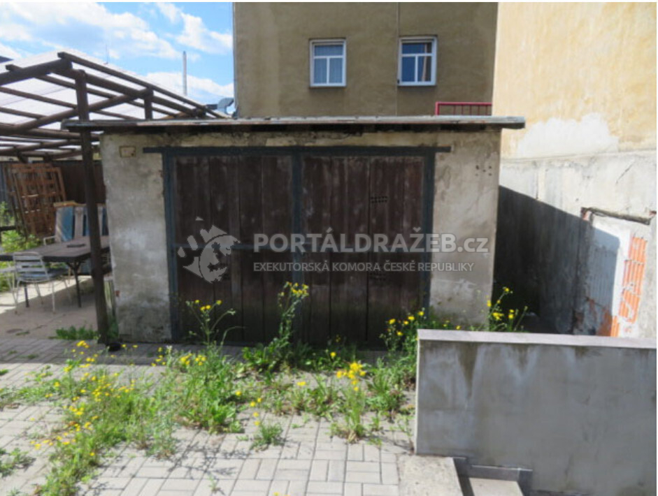 Ideální spoluvlastnický podíl1/4 garáže s pozemkem v k.ú. Bohatice, Karlovy Vary