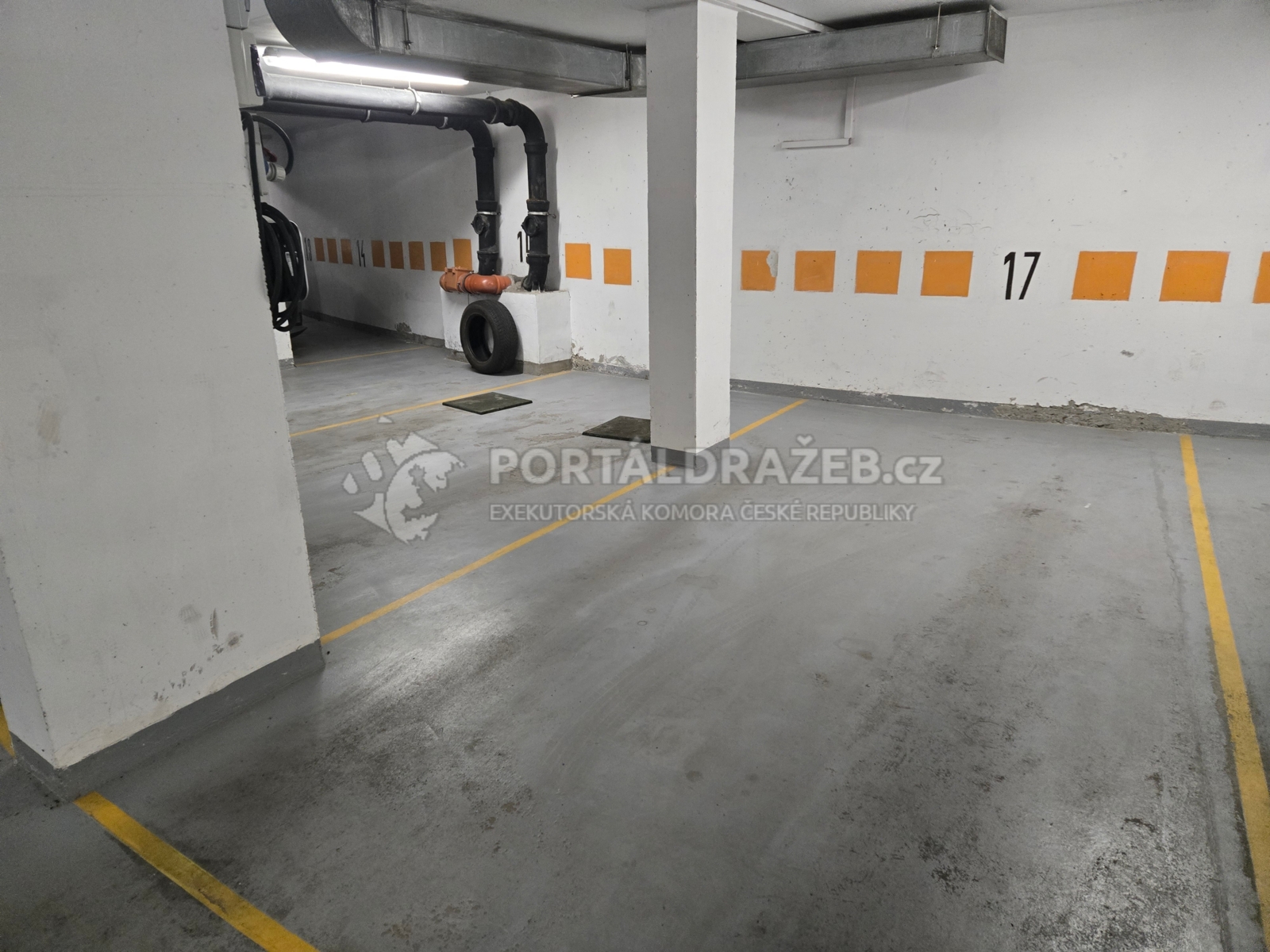 Garážové stání (č.j. 609/100) vč. podílu  (