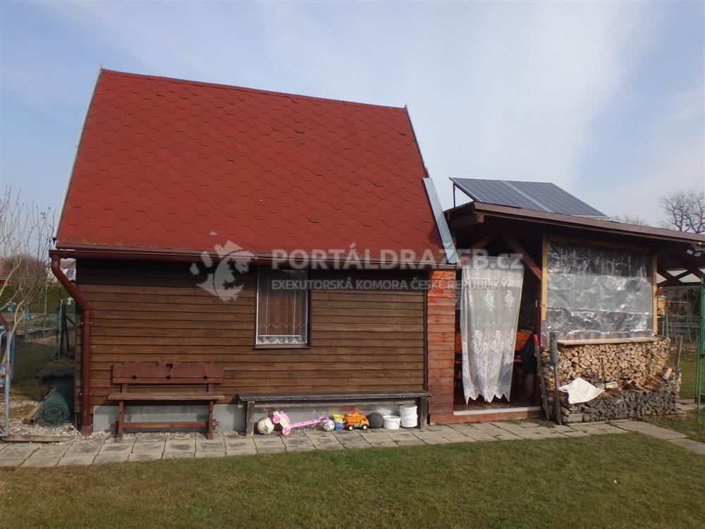 Dražba 1/2 spoluvlastnického podílu na dřevěné